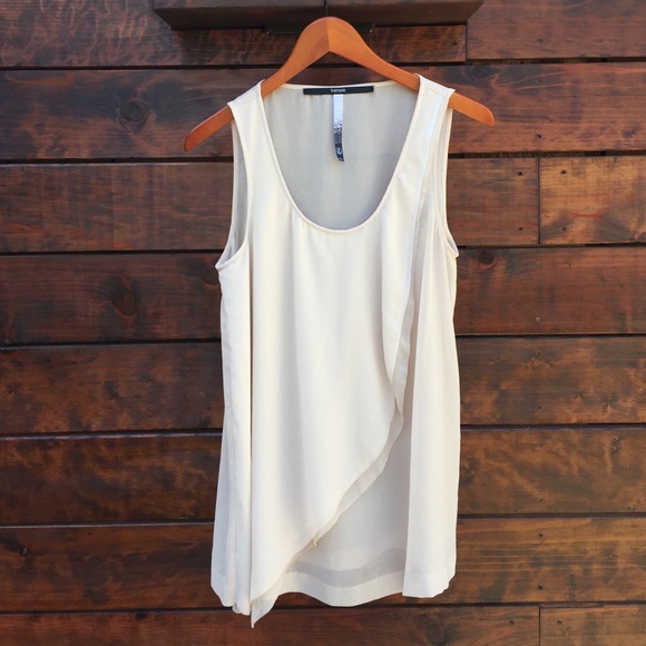 Sheer cream asymmetrical ruffle top