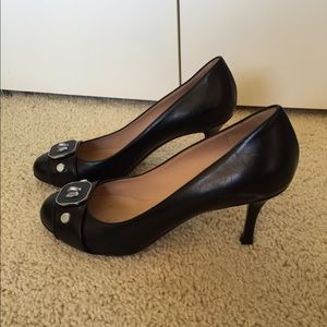 Longchamp black leather heels with hardware logo