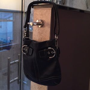 Classic Coach Hobo in black leather.