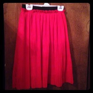 Red Forever 21 pleated skirt.