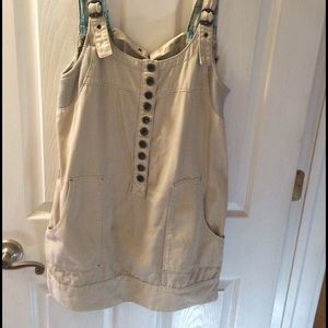 free people. Light khaki jumper. No tag never worn