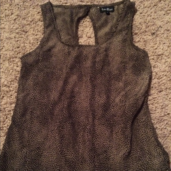 Tank top fancier