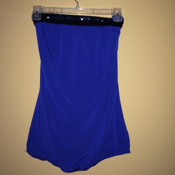 blue top with black sequence on top