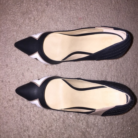 Just Fab 3.5-4 inch heel. Worn once. Multicolored