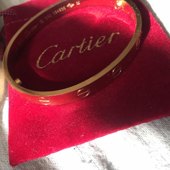 Gold love screw bracelet.