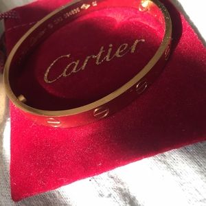 Gold love screw bracelet.