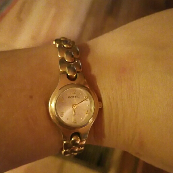 Gold fossil watch