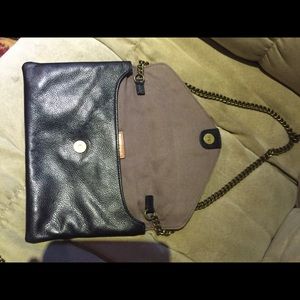 Jcrew clutch , used only 2 times ,100% leather.