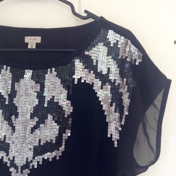 Flowy sequin blouse (Urban Outfitters)