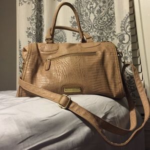 Beige/tan Steve Madden purse with gold accents