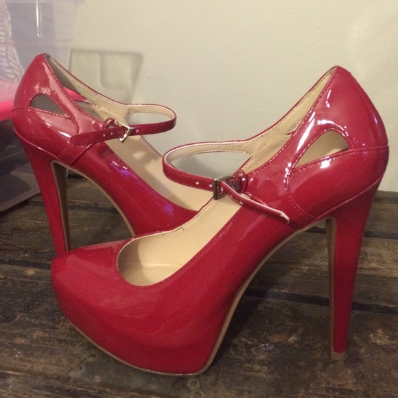 Red patent leather cut out pumps