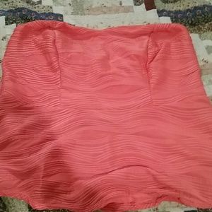 Strapless orangish, coral in color