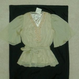 American Glamour belted top