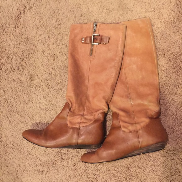 Distressed knee high boots