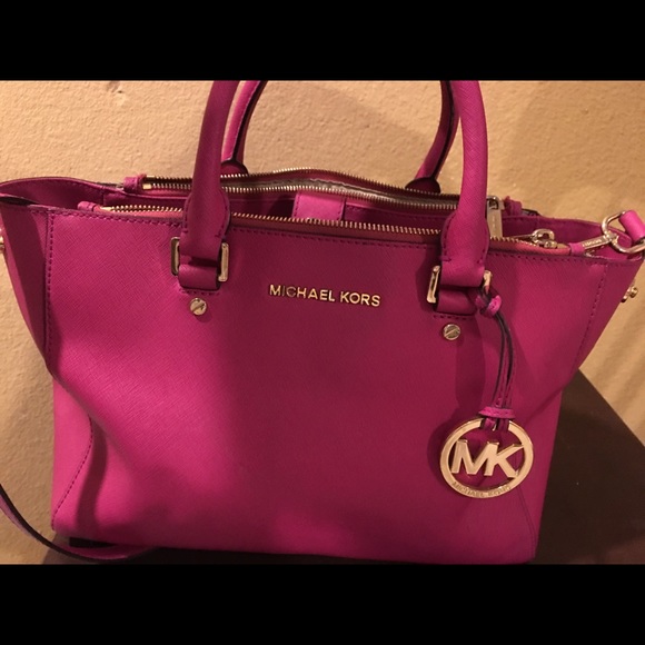 Solldddddddddd.  AUTHENTIC MK raspberry purse