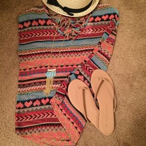 Sleeveless, aztec print top with cut out design