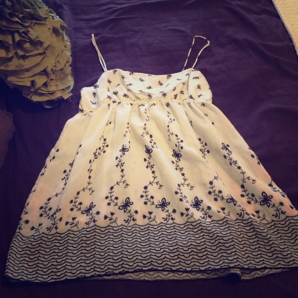 Longer top with flower detailing