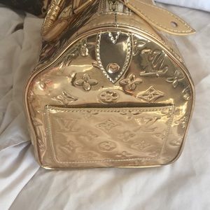 NA gold LV bag