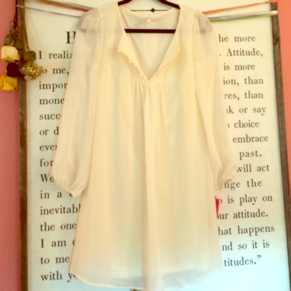 Long sleeve cream baby doll dress.