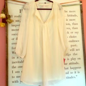 Long sleeve cream baby doll dress.