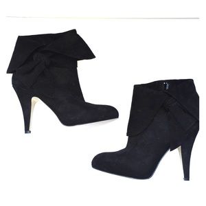 Black suede ankle boots with bows