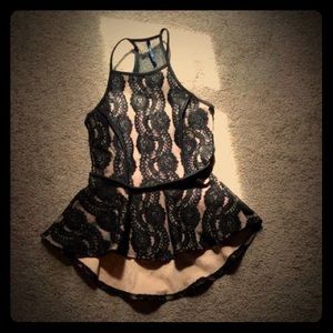 Black and nude lace/mesh peplum top