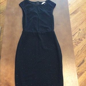 Black sparkling dress.