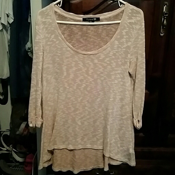 Delicate symmetrical sweater.