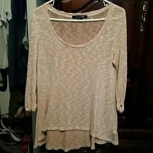 Delicate symmetrical sweater.