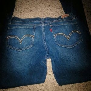 Levis 524 low rise jeans