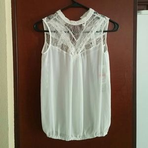 Sleeveless lace blouse