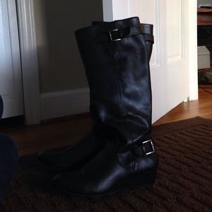 Black boots with buckle detail