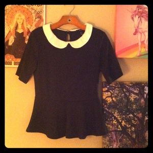 Black peplum shirt with white pilgrim collar
