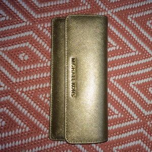 gold metallic Michael Kors wallet