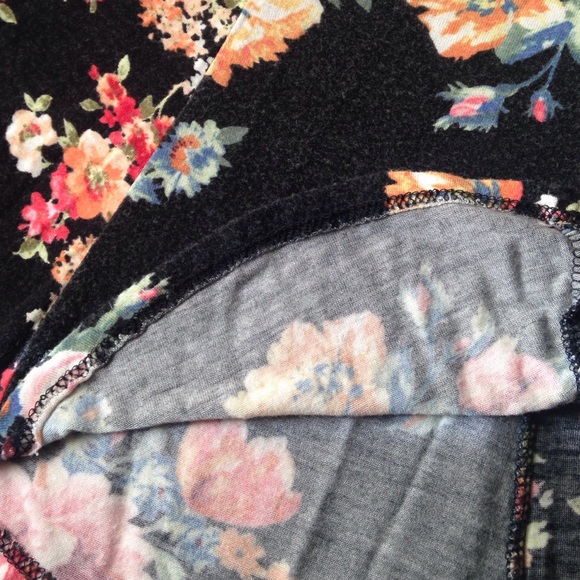 Black peplum shirt with flower patterns. - Picture 3 of 3