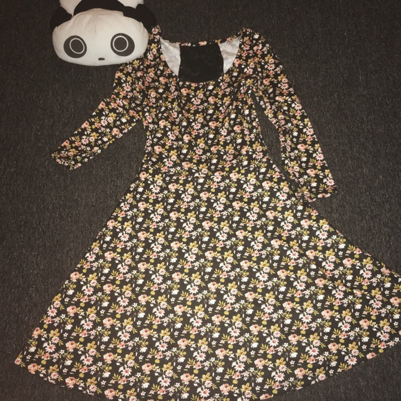 Black skater dress with spunky flower pattern
