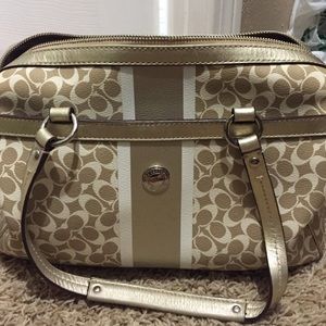 Gold coach purse