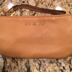Michael Kors wristlet or use as mini makeup bag.
