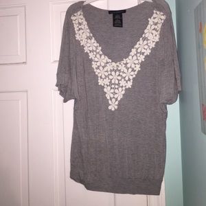 grey and white flowered top
