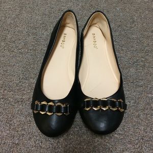 NWOT Black and gold flats