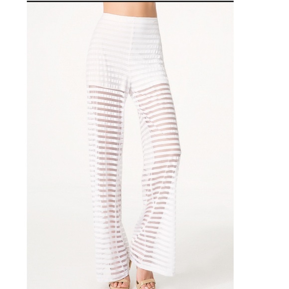 Brand new Bebe Striped Flare Pants