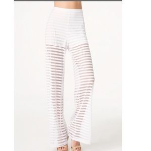 Brand new Bebe Striped Flare Pants