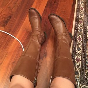 Tall brown riding boots