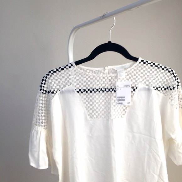 H&M Tops - Brand new* Blouse with trumpet sleeves H&M Tops - Brand new* Blouse with trumpet sleeves