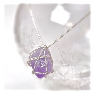 Sterling silver necklace with amethyst.
