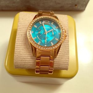 Fossil rose gold watch with diamond bezel