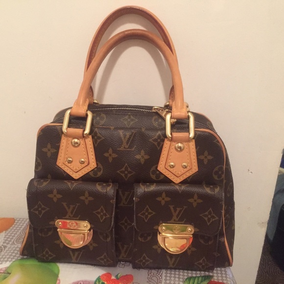 SOLD MERC Louis Vuitton Manhattan purse