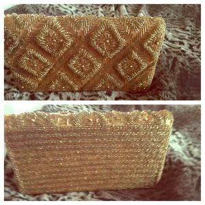 Gold clutch bag