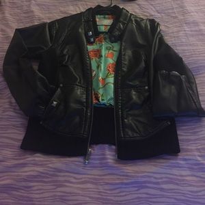 Black leather GUESS jacket.