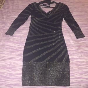 Black and gold dress with tie on the back